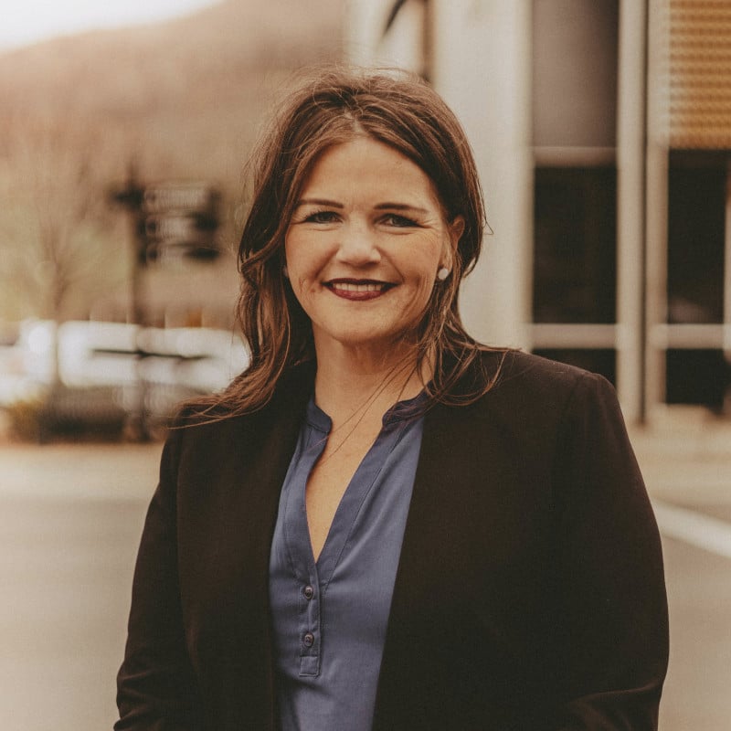 May contain one person smiling outdoors.