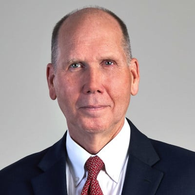 May contain one person wearing a suit and tie.