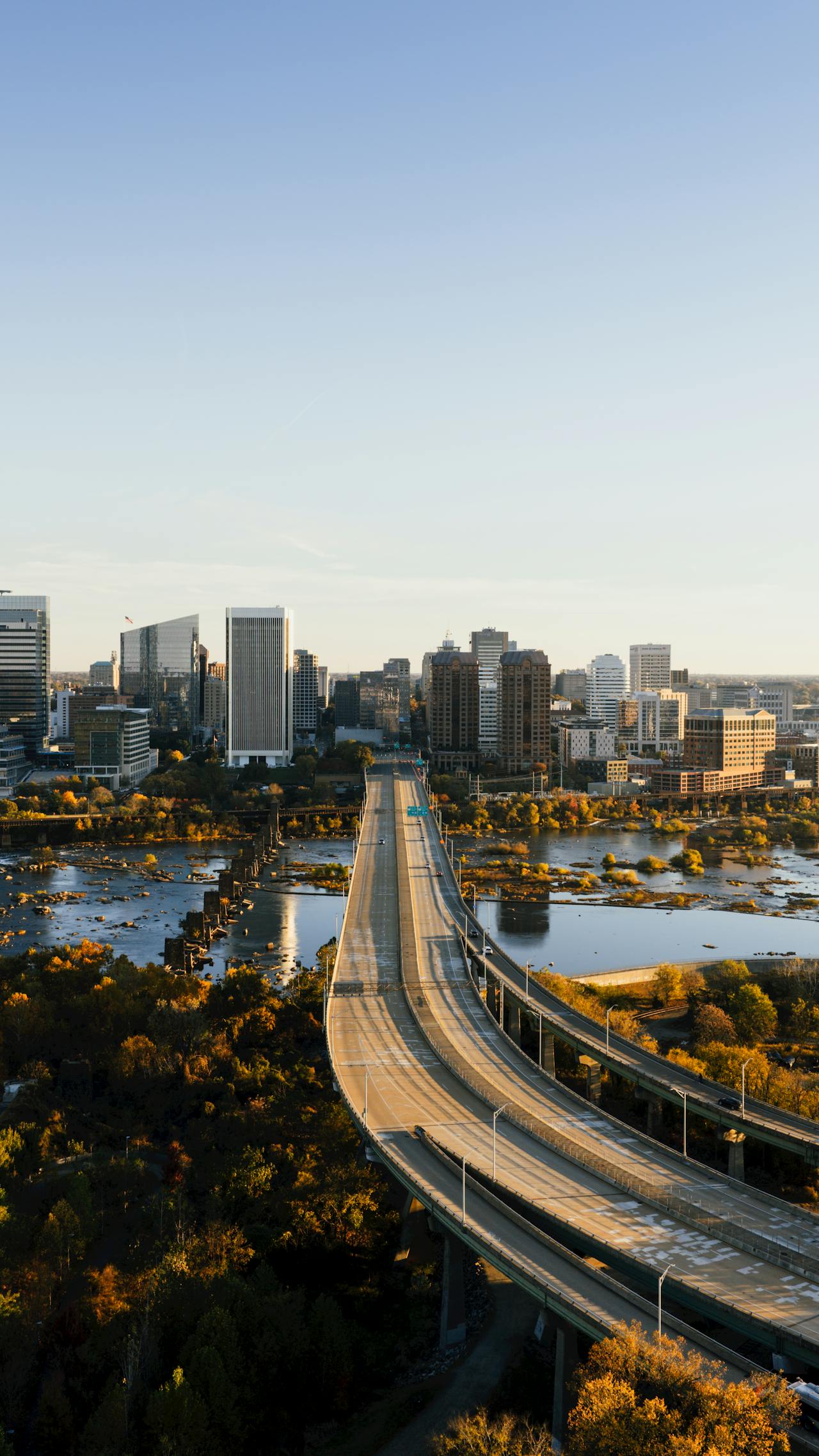 May contain a cityscape with a highway and a river.