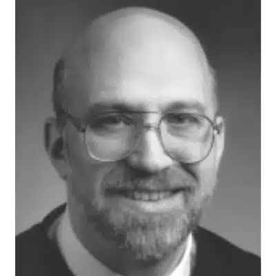 May contain one person smiling and wearing glasses.
