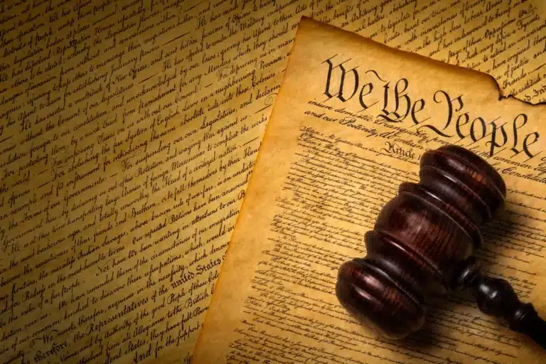May contain a gavel on old documents.