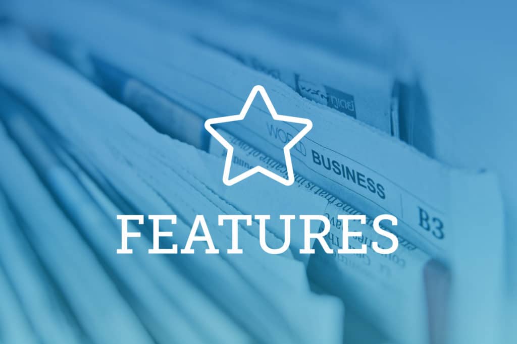 May contain text "FEATURES" overlayed on newspapers with a star icon.