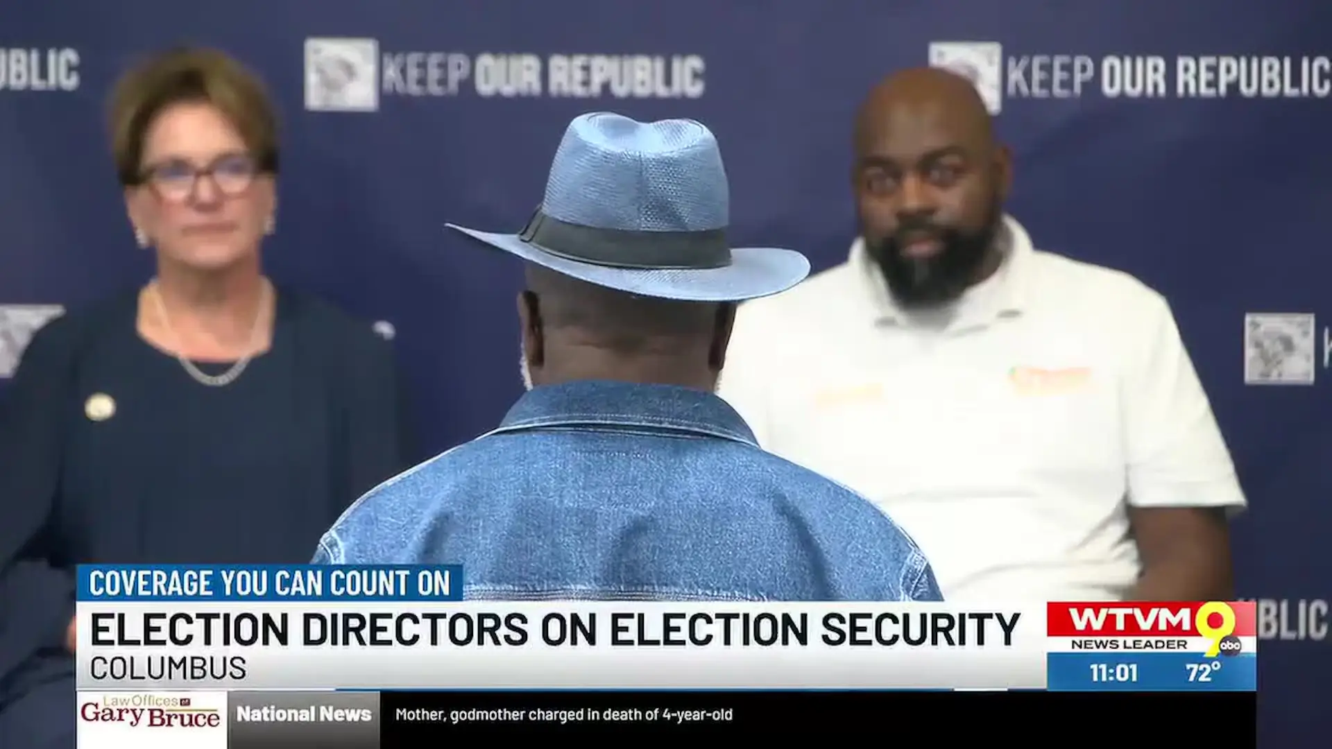 May contain three people with a blue backdrop reading "Keep Our Republic".